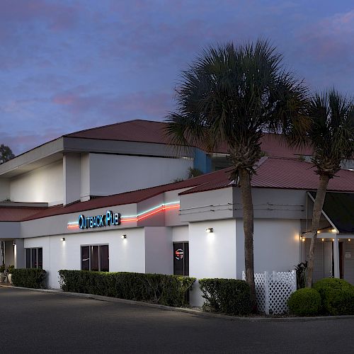 An image of a building with a sign that reads 